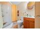 Updated bathroom with a shower and wood vanity at 409 W Lakeview Dr, Nineveh, IN 46164