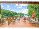 Spacious lakefront deck with seating and firepit, ideal for entertaining at 409 W Lakeview Dr, Nineveh, IN 46164
