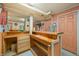 Relaxing basement bar with wooden countertop and storage at 409 W Lakeview Dr, Nineveh, IN 46164