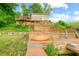 Lakefront dock with kayak and stairs to the house at 409 W Lakeview Dr, Nineveh, IN 46164