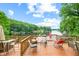 Spacious lakefront deck with seating and fire pit at 409 W Lakeview Dr, Nineveh, IN 46164
