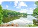 Scenic view of a lake with houses and lush greenery at 409 W Lakeview Dr, Nineveh, IN 46164