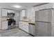Modern kitchen with stainless steel appliances and butcher block countertops at 929 Olin Ave, Indianapolis, IN 46222