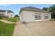Attached two-car garage with white doors at 8292 S State Road 39 S Rd, Clayton, IN 46118