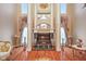 Two-story marble fireplace is a stunning focal point in the living room at 8292 S State Road 39 S Rd, Clayton, IN 46118