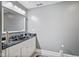Bathroom features a vanity with granite countertop at 8292 S State Road 39 S Rd, Clayton, IN 46118