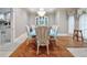 Formal dining room features hardwood floors, chandelier, and elegant furniture at 8292 S State Road 39 S Rd, Clayton, IN 46118