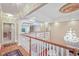 Second floor landing with chandelier and views of the main level at 8292 S State Road 39 S Rd, Clayton, IN 46118