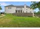 House backyard with retaining wall and landscaping at 8292 S State Road 39 S Rd, Clayton, IN 46118