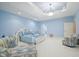Light blue bedroom with white furniture and sitting area at 8292 S State Road 39 S Rd, Clayton, IN 46118