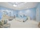 Spacious bedroom with light blue walls and a large bed at 8292 S State Road 39 S Rd, Clayton, IN 46118