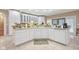 Spacious kitchen with white cabinets, granite counters, and island at 8292 S State Road 39 S Rd, Clayton, IN 46118