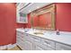 White vanity with gold mirror and coral walls at 8292 S State Road 39 S Rd, Clayton, IN 46118
