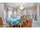 Bright dining room with hardwood floors, chandelier and views to the kitchen at 8292 S State Road 39 S Rd, Clayton, IN 46118