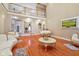 Elegant living room boasts high ceilings, hardwood floors, and ornate furniture at 8292 S State Road 39 S Rd, Clayton, IN 46118