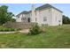 House backyard with retaining wall and landscaping at 8292 S State Road 39 S Rd, Clayton, IN 46118