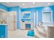 Bright bathroom with white vanity and step-up tub at 8292 S State Road 39 S Rd, Clayton, IN 46118