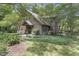 Log cabin home with stone and wood accents at 2705 S 975 E, Zionsville, IN 46077