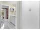 Clean bathroom with white vanity and view of adjacent bedroom and library at 2705 S 975 E, Zionsville, IN 46077