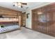 Cozy bunk bed room with rustic log walls and ample closet space at 2705 S 975 E, Zionsville, IN 46077