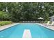 Stunning in-ground pool with diving board, perfect for summer fun at 2705 S 975 E, Zionsville, IN 46077