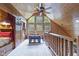 Charming loft playroom with built-in bunks, a table, and large windows at 2705 S 975 E, Zionsville, IN 46077