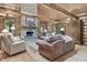 Cozy living room features stone fireplace and hardwood floors at 2705 S 975 E, Zionsville, IN 46077