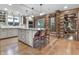 Modern kitchen with granite countertop and a log accent wall at 2705 S 975 E, Zionsville, IN 46077