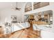 Spacious living room with high ceilings, hardwood floors and a cozy sitting area at 8235 Ridge Valley Ct, Indianapolis, IN 46278