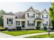 Brick two-story house with a landscaped lawn at 8235 Ridge Valley Ct, Indianapolis, IN 46278