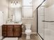 Bathroom with a vanity, toilet, and glass shower at 8235 Ridge Valley Ct, Indianapolis, IN 46278