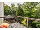 Deck with a view of the backyard and surrounding trees at 8235 Ridge Valley Ct, Indianapolis, IN 46278