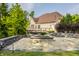 House exterior showcasing back deck and fire pit area at 8235 Ridge Valley Ct, Indianapolis, IN 46278
