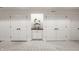 Unfinished basement with white walls, carpet, and built-in shelving at 8235 Ridge Valley Ct, Indianapolis, IN 46278