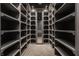 Large walk-in closet with numerous built-in shelves at 8235 Ridge Valley Ct, Indianapolis, IN 46278