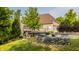 House back with deck, firepit, and retaining walls at 8235 Ridge Valley Ct, Indianapolis, IN 46278
