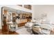 Open floor plan with kitchen and living area featuring hardwood floors and modern amenities at 8235 Ridge Valley Ct, Indianapolis, IN 46278