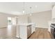 Modern kitchen with stainless steel appliances and island at 19155 River Jordan Dr, Westfield, IN 46074