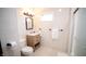 Updated bathroom with a large shower and stylish vanity at 526 N Emerson Ave, Indianapolis, IN 46219