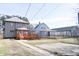 View of multiple houses with fenced backyards and decks at 526 N Emerson Ave, Indianapolis, IN 46219