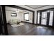 Living room with dark hardwood floors and a couch at 526 N Emerson Ave, Indianapolis, IN 46219