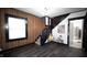 Inviting entryway with hardwood floors and staircase at 526 N Emerson Ave, Indianapolis, IN 46219
