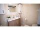 Clean bathroom with updated vanity and neutral tile at 526 N Emerson Ave, Indianapolis, IN 46219