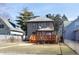 House with a wooden deck and fenced backyard at 526 N Emerson Ave, Indianapolis, IN 46219