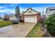 Paved driveway leading to attached two-car garage at 9723 Jupiter Pass, Carmel, IN 46032