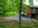 Aerial view showcasing the home's side elevation and driveway at 8157 Center Lake Rd, Nineveh, IN 46164