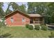 Rustic wooden house with a small porch and yard at 8157 Center Lake Rd, Nineveh, IN 46164