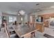 Kitchen and dining area with hardwood floors and an island at 8157 Center Lake Rd, Nineveh, IN 46164