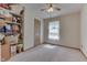 Bright bedroom with carpeted floor and ceiling fan at 8157 Center Lake Rd, Nineveh, IN 46164