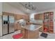 Spacious kitchen with oak cabinets, island, and stainless steel appliances at 8157 Center Lake Rd, Nineveh, IN 46164